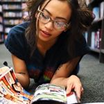 young woman or teen reading comics graphic novels feature