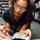 young woman or teen reading comics graphic novels feature