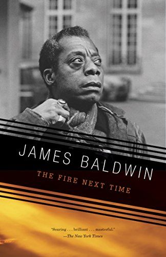 詹姆斯·鲍德温的《The Fire Next Time》封面，展示了一张詹姆斯·鲍德温看向一边的黑白照片
