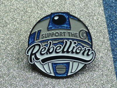 Star Wars R2D2 droid enamel pin with the text 'Support the Rebellion'