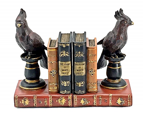 Birds on pedestals on books bookends