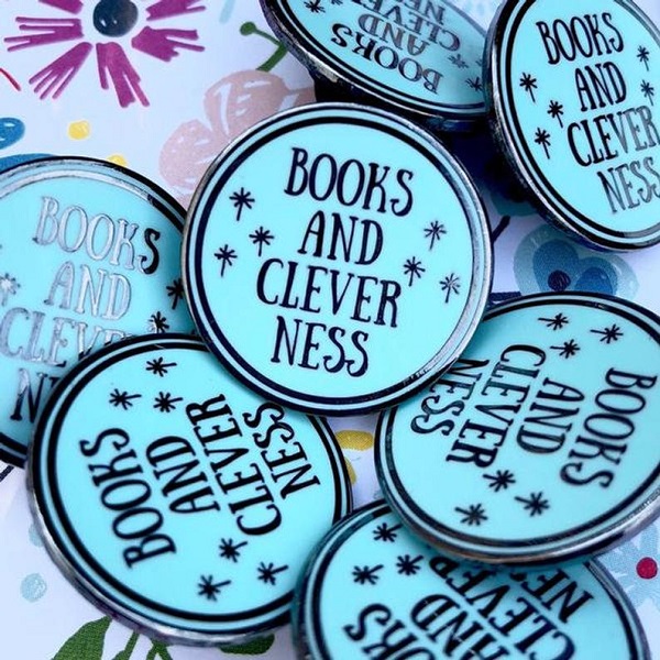 Books and cleverness enamel pin