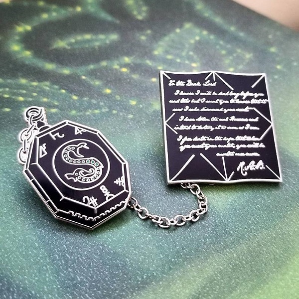 Salazar’s locket with Regulus Black’s letter enamel pin