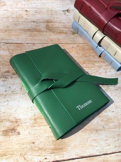 green leather journal cover with tie