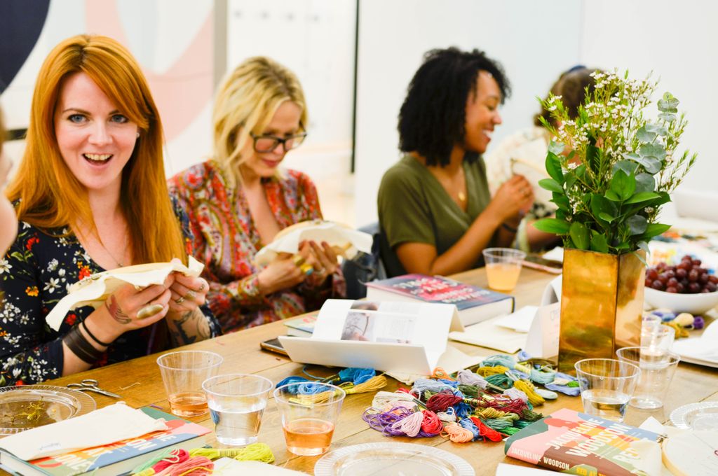Women cross-stitching at CRAFTED x Riverhead's Sip & Stitch book event