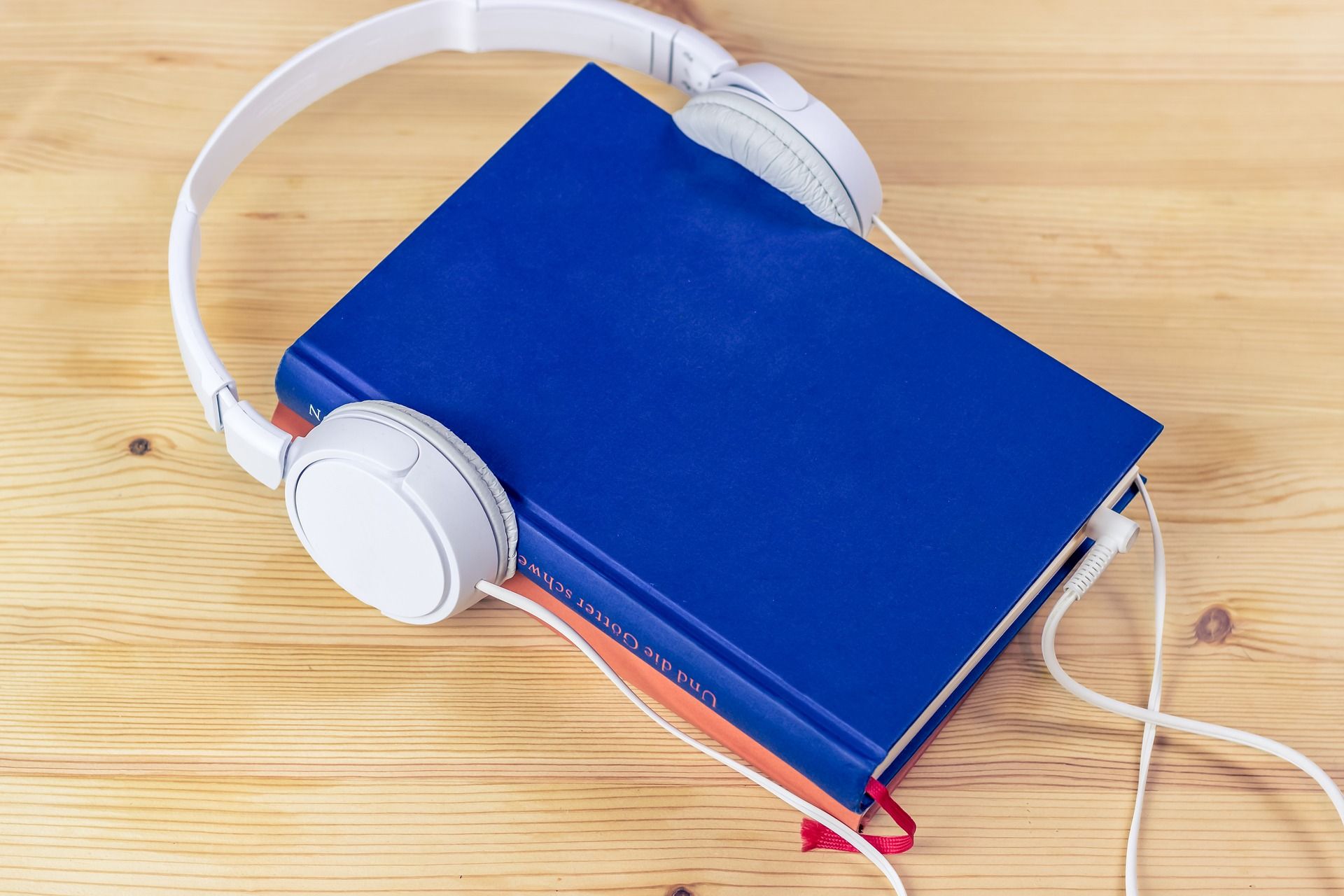 A book with headphones on it
