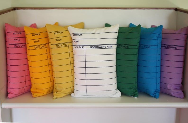 Brightly colored library card pillows