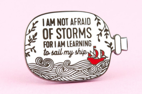 Not Afraid of Storm Enamel Pin from All The LITTLE WOMEN Etsy Finds | bookriot.com