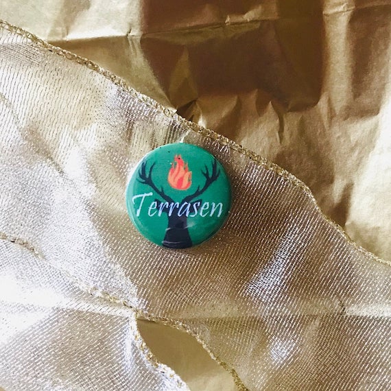 Terrasen button of Sarah J. Maas's Throne of Glass series