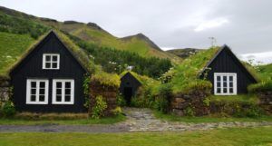Village cottage among green hills