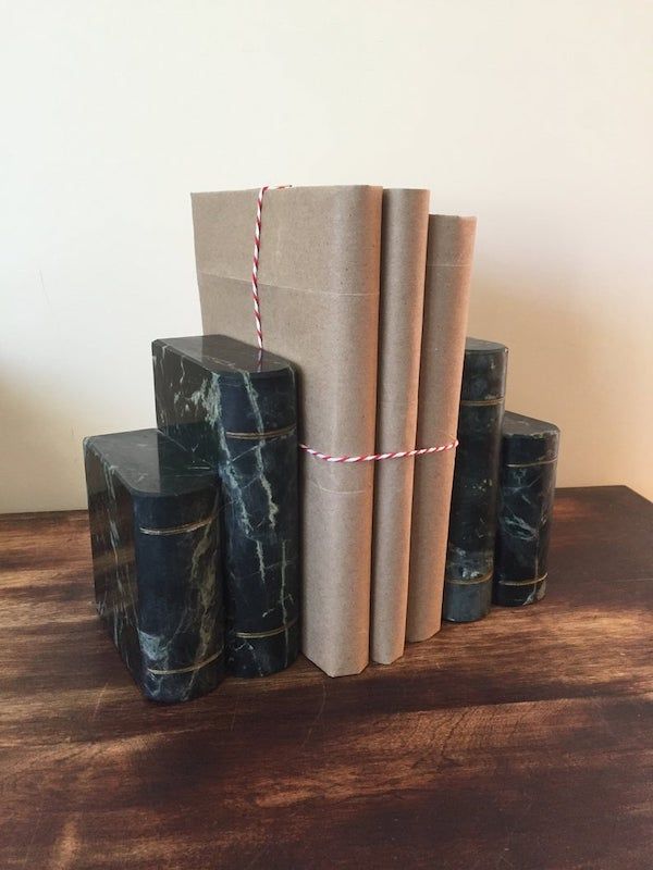 Bookends made out of marble books. Image from Etsy shop.