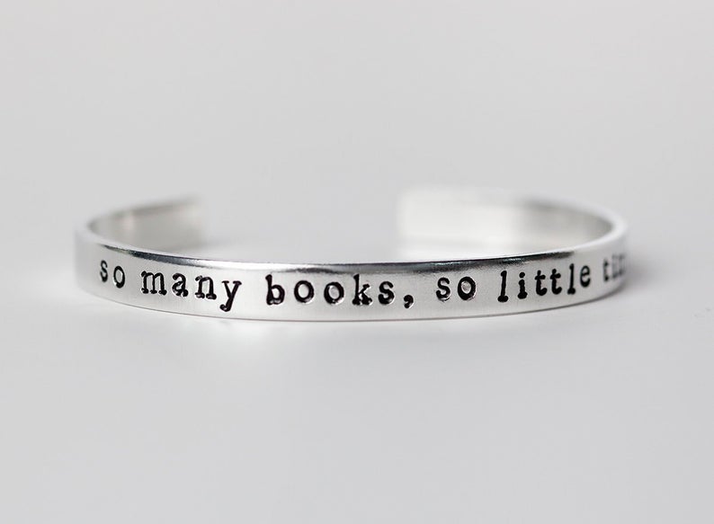 http://www.awin1.com/cread.php?awinmid=6220&awinaffid=258769&clickref=&p=https://www.etsy.com/listing/188323522/literary-cuff-bracelet-so-many-books-so?ga_order=most_relevant&ga_search_type=all&ga_view_type=gallery&ga_search_query=book+jewelry&ref=sr_gallery-1-23&organic_search_click=1
