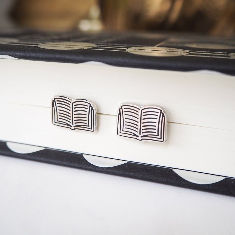 http://www.awin1.com/cread.php?awinmid=6220&awinaffid=258769&clickref=&p=https://www.etsy.com/listing/699748963/book-stud-earrings-silver-book-earrings?ga_order=most_relevant&ga_search_type=all&ga_view_type=gallery&ga_search_query=book+jewelry&ref=sr_gallery-1-26&organic_search_click=1&cns=1