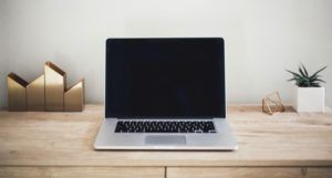 a photo of a laptop on a desk