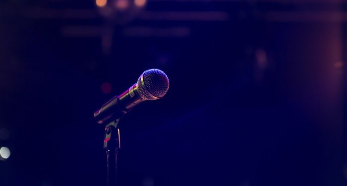 a photo of a microphone on stage