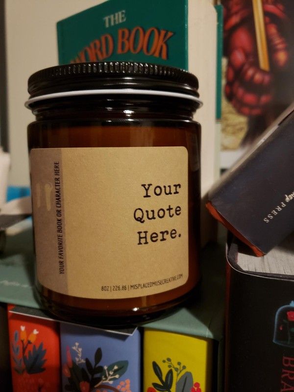 Glass jar candle with kraft paper label "your quote here"