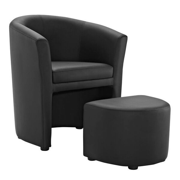 black chair with matching ottoman that slides under the chair