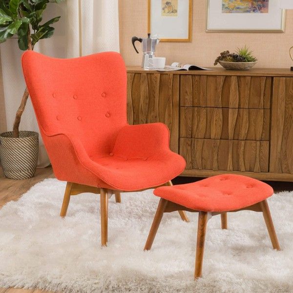 Orange lounge chair with button accents