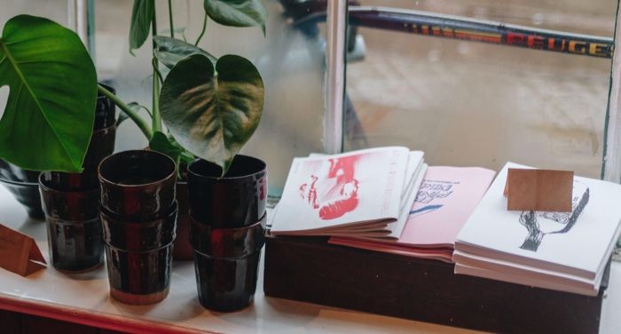 zines on windowsill