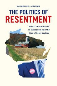 Pictured Book cover of The Politics of Resentment featuresa barn in rural Wisconsin