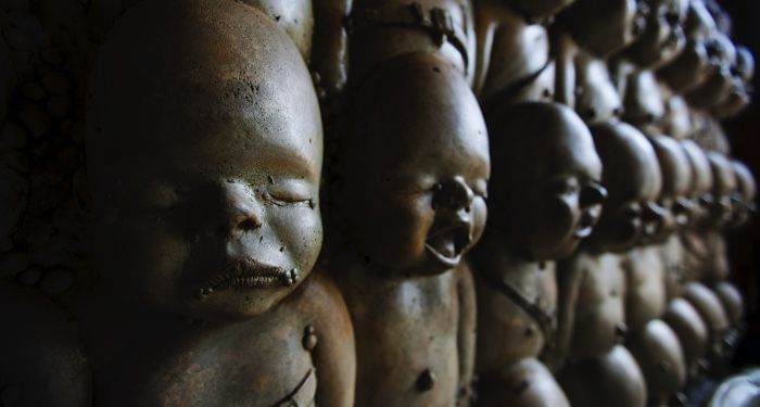 creepy dolls in a row