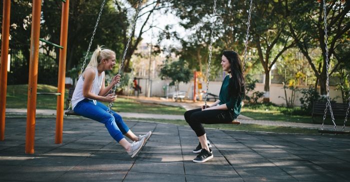 friends hanging out in a playground