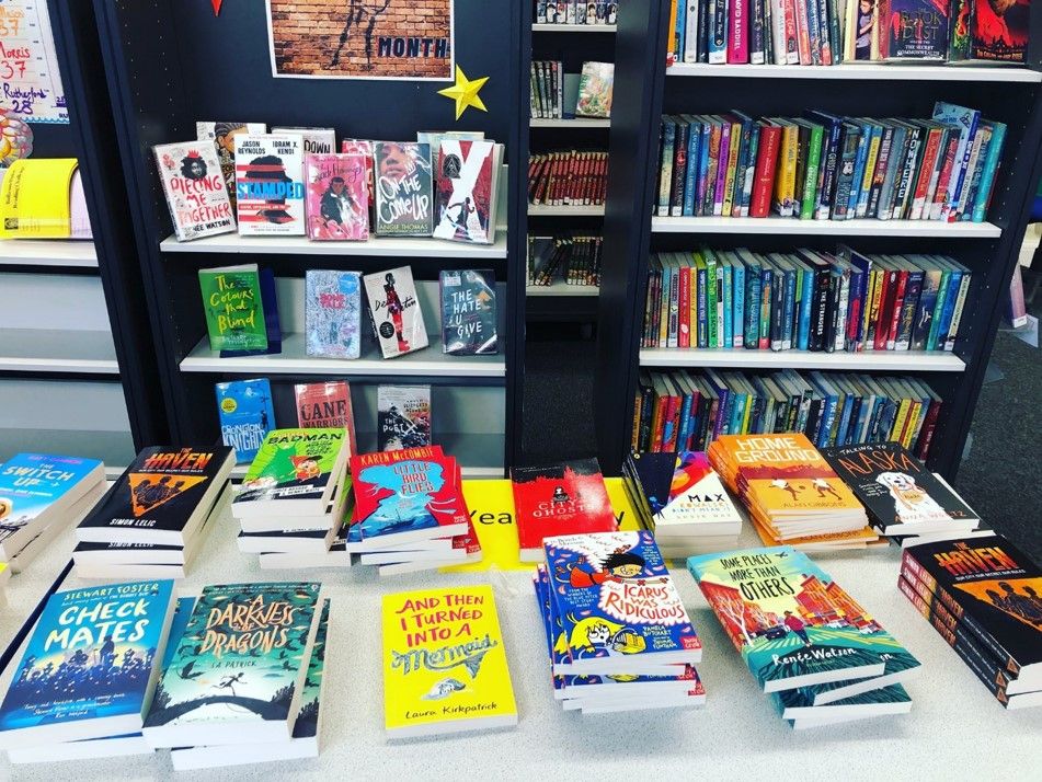 Books on a table; image property of Lucas Maxwell