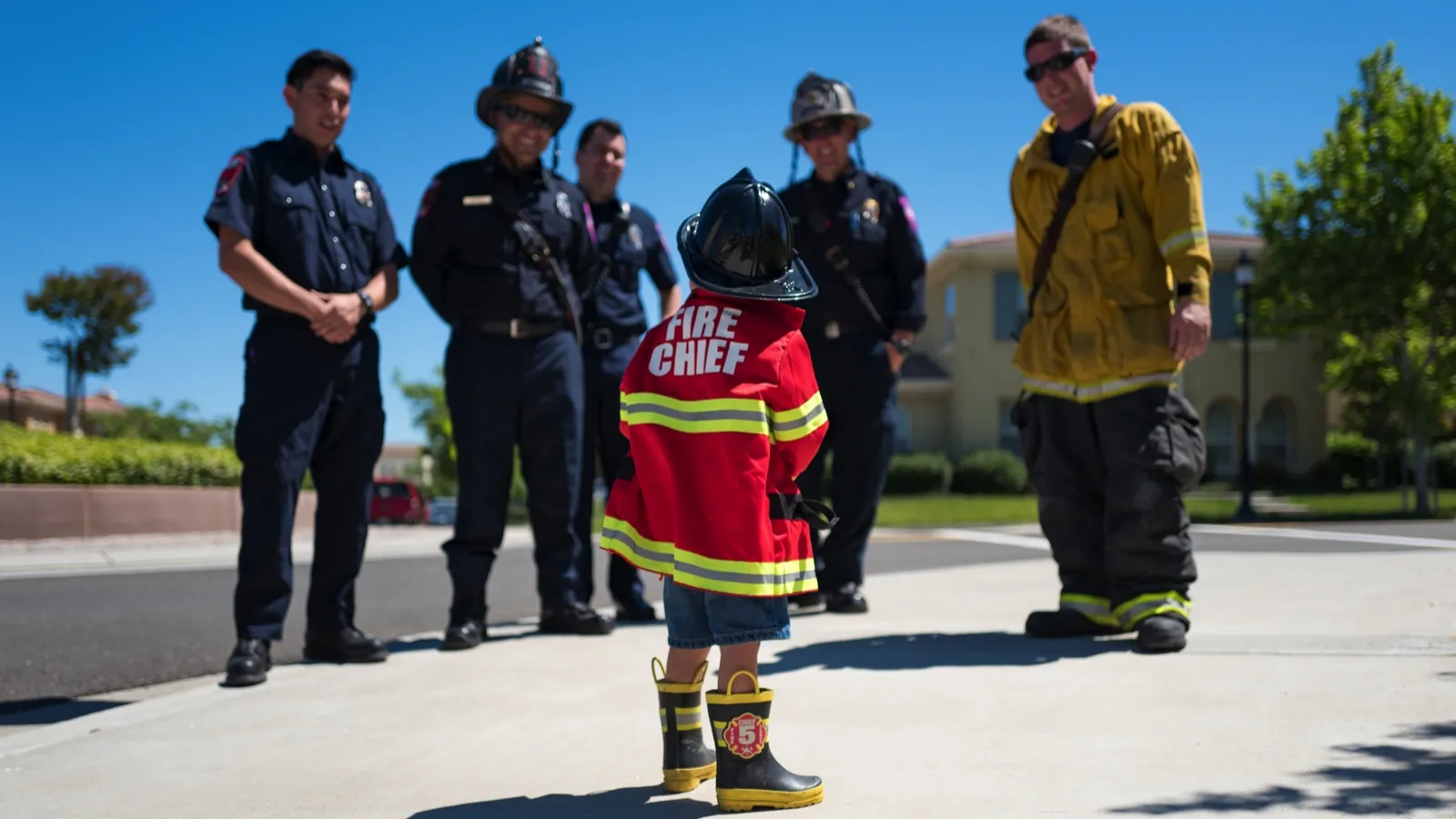 child pretending to be a firefighter
