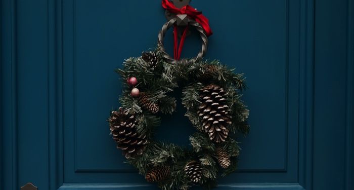 wreath on a blue door for christmas holiday