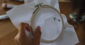 image of an embroidery hoop and fabric https://www.pexels.com/photo/diverse-children-doing-embroidery-and-painting-5063578/