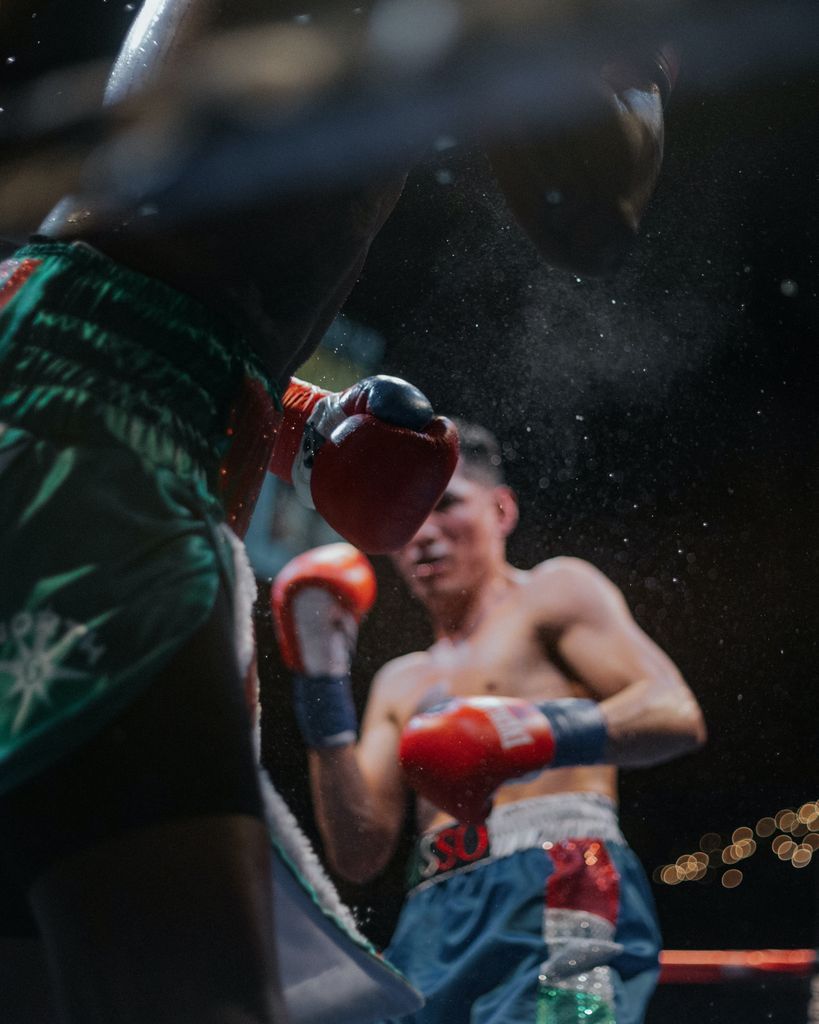 two men inside boxing ring