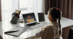 image of a young girl taking online class / remote learning https://www.pexels.com/photo/little-girl-taking-online-classes-4261789/