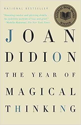 cover of The Year of Magical Thinking by Joan Didion, showing the title and author name in enlarged black and blue text against a beige background