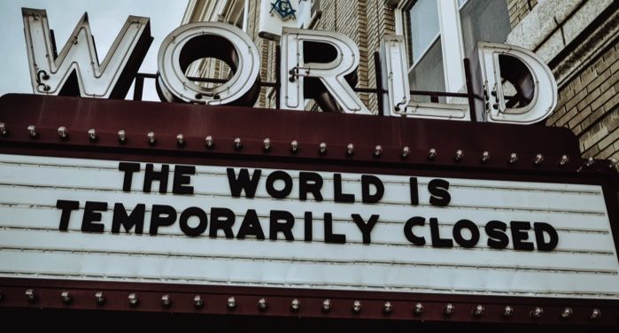 image of a marquee sign that reads, "The world is temporarily closed." https://unsplash.com/photos/Q8m8cLkryeo