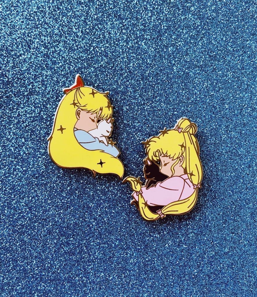 Sailor Moon and Sailor Venus with Artemis and Luna pins