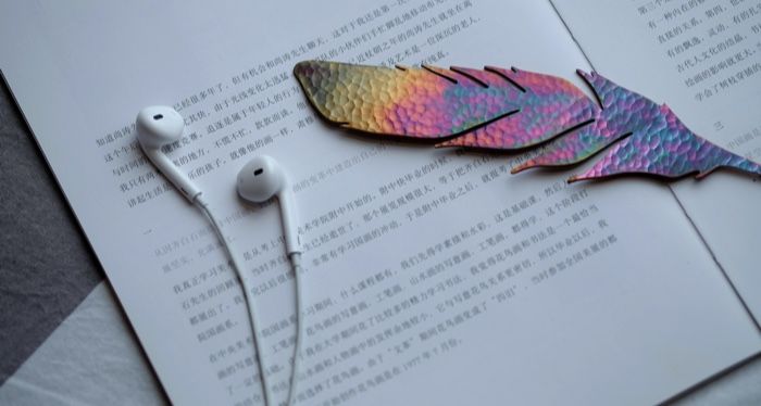 bookmark on book with headphones