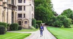 college student walking through university campus