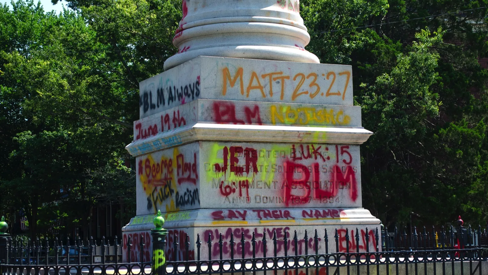 monument with black lives matter graffitti in richmond va