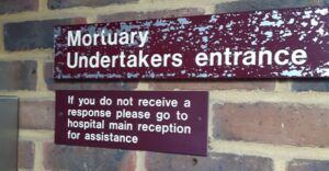 morturary undertakers entrance sign for weird jobs