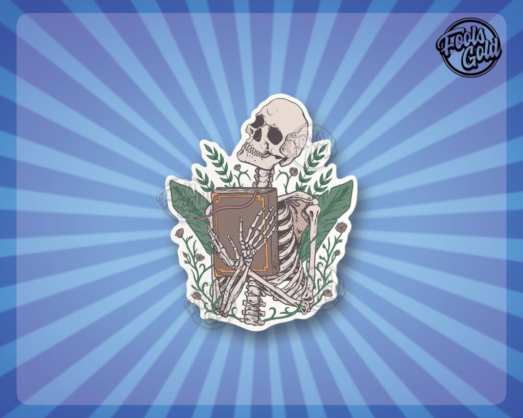 Sticker of a skeleton clutching a book to its chest