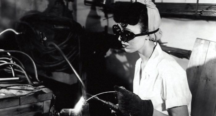woman in a factory welding during World War 2