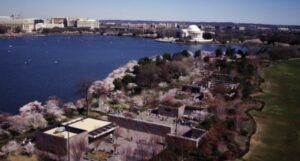 Aerial view of Washington, D.C., showing the FDR Memorial in the foreground at Cherry Blossom Festival time