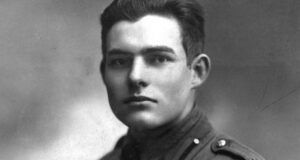closeup of black and white portrait of Ernest Hemingway in military uniform https://commons.wikimedia.org/wiki/Category:Ernest_Hemingway#/media/File:Ernest_Hemingway_in_Milan_1918_retouched_2.jpg
