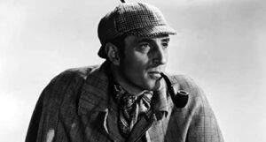 black and white image of Basil Rathbone in The Adventures of Sherlock Holmes film