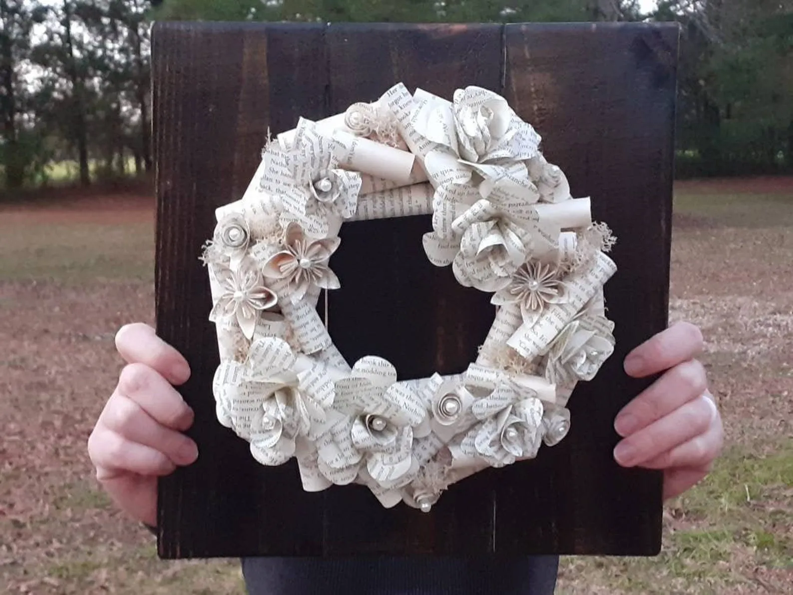 Image of a wreath made of book pages. 