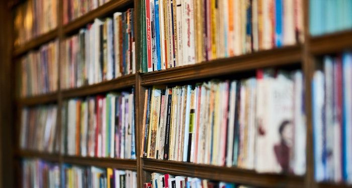 bookshelves of used paperbacks