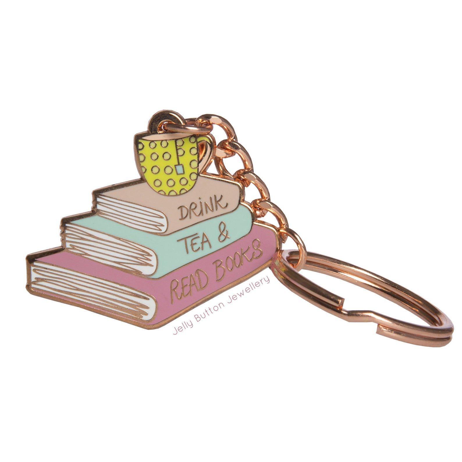Image of a roase gold keychain that depicts a stack of books and a tea cup, and reads "Drink tea & read books."