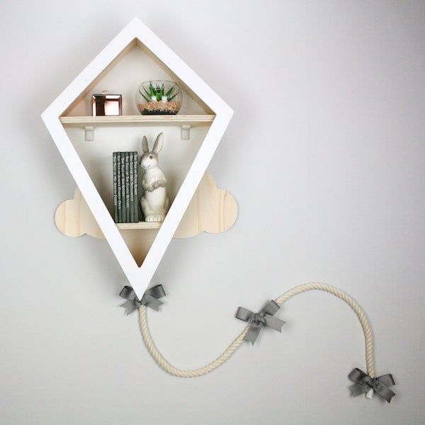 image of kite-shaped nursery bookshelf