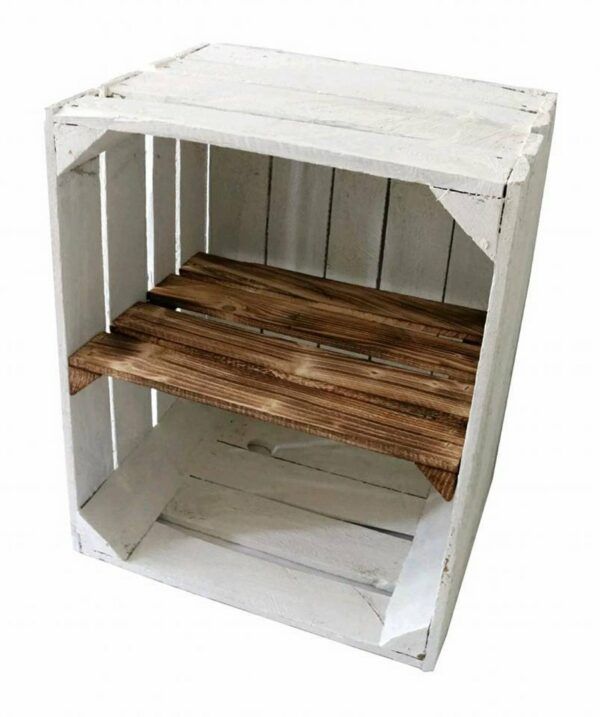Small bookshelf made from a crate, white on the outside with one wooden shelf