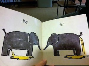 image of two elephants labeled boy and girl urinating